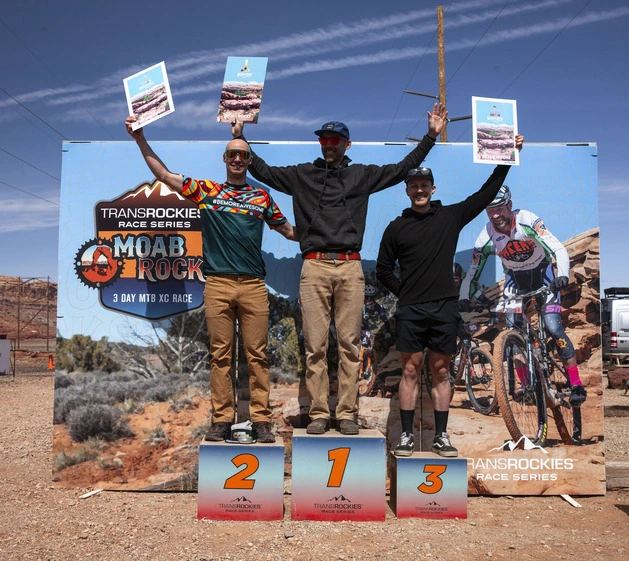MTB race podium with custom hand-drawn finisher awards